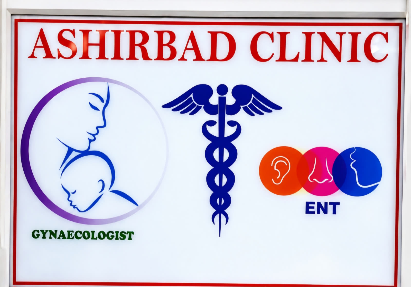 Ashirbad Clinic signboard showing Gynaecology and ENT specialties